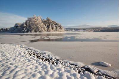 Frozen Loch Insh  in winter, Cairngorms NP, Scotland. 
